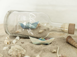 Geldgeschenk zur Geburt als Flaschenpost verpacken