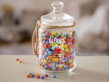 Graviertes Glas mit Glückspillen