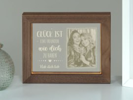 Foto im Leuchtrahmen Motiv Glück ist